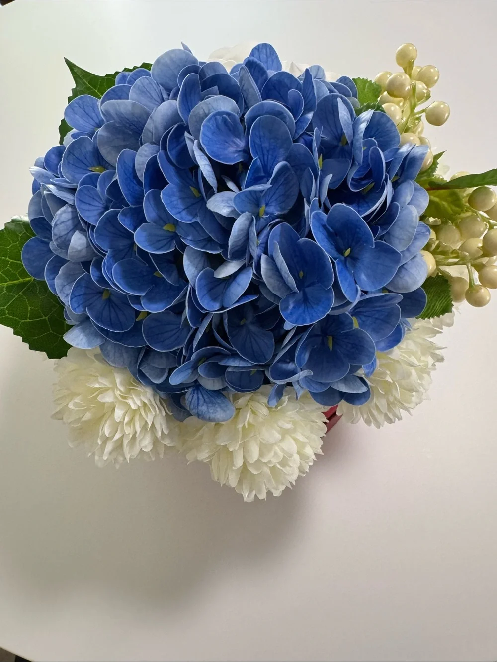 Artificial Floral Arrangement in Blue and Cream with Red Box